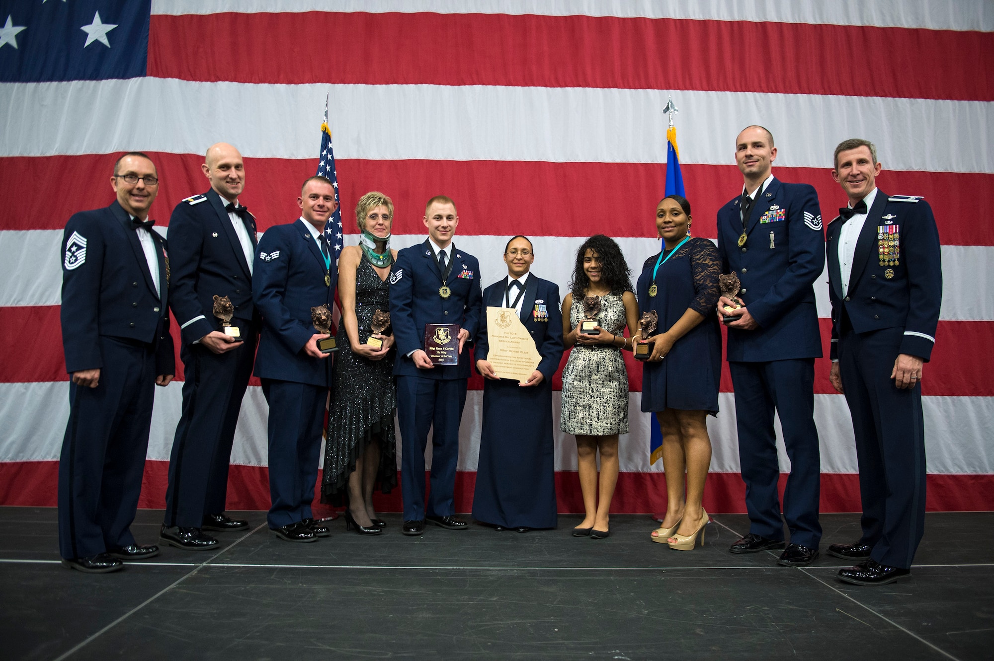 The 2016 Annual Award winners pose for a photo with Moody’s senior leaders during a ceremony, Feb. 3, 2017, at Moody Air Force Base, Ga. Annual awards were given to those that went above and beyond their duty title while also striving for self-improvement. (U.S. Air Force photo by Airman 1st Class Greg Nash)