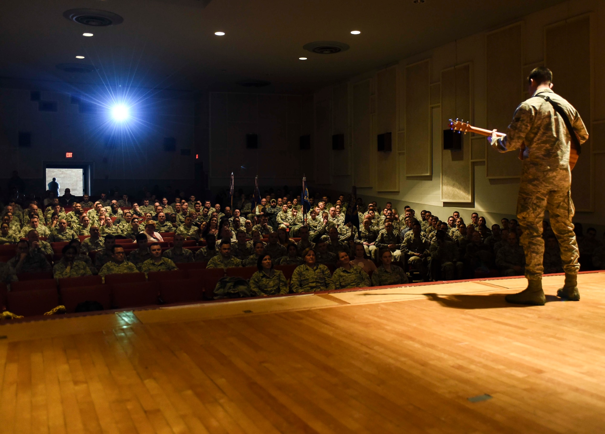 Senior Airman James Pratt, a heavy equipment operator assigned to the 28th Civil Engineer Squadron, performs John Mayer’s “Age of Worry” in front of the 28th Mission Support Group inside the base theater during their annual awards ceremony, Jan. 26, 2017, at Ellsworth Air Force Base, S.D. Four days later, Pratt was announced the Air Force Entertainer of the Year and was congratulated by Col. Gentry Boswell, the commander of the 28th Bomb Wing, in a coining ceremony. (U.S. Air Force photo by Airman 1st Class Randahl J. Jenson)