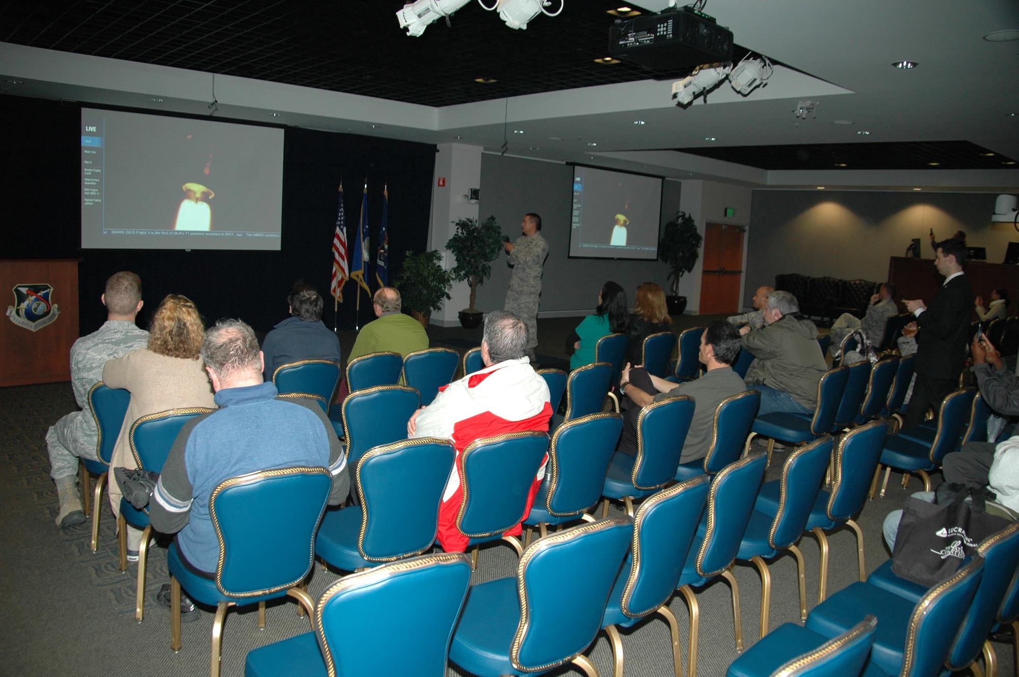 Space and Missile Systems Center personnel watch the televised launch of an Atlas V 401 Evolved Expendable Launch Vehicle, carrying the third Space Based Infrared Systems Geosynchronous Earth Orbiting satellite into orbit during an SMC Presents “Launch and Learn” session in the Gordon Conference Center at Los Angeles Air Force Base in El Segundo, California.  (U.S. Air Force photo/Jim Spellman)
 
