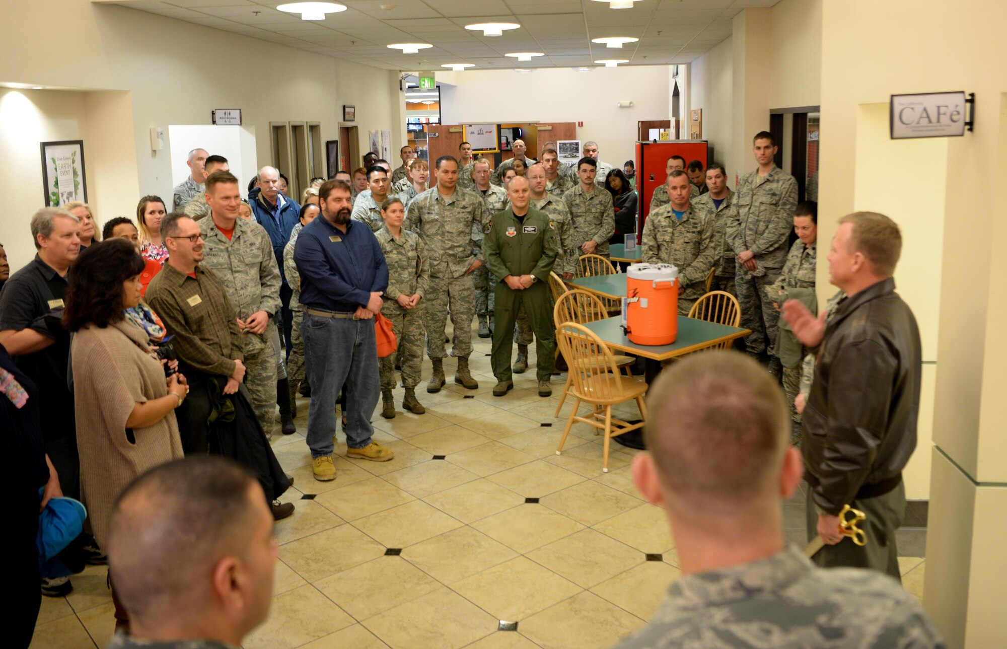 Col. Christopher Stricklin (right), 9th Reconnaissance Wing vice commander address an audience in attendance for the opening of the California CAFé, at the Beale Community Activity Center, Feb. 3, 2017, at Beale Air Force Base, California. The intent of the CAFé is to aid in the improvement of social fitness at Beale. (U.S. Air Force photo/ Staff Sgt. Bobby Cummings)

