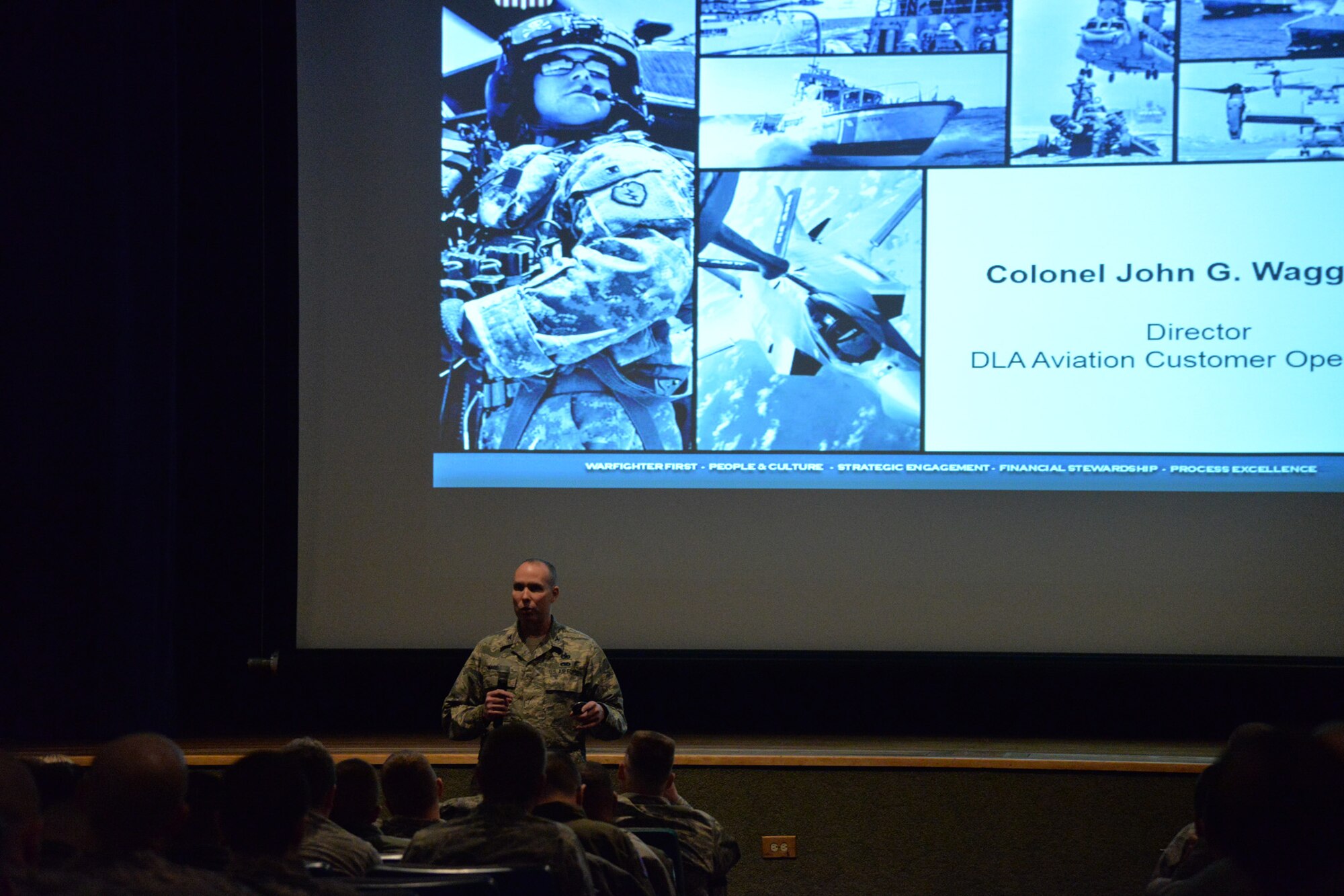 Col. John Waggoner, Defense Logistics Agency aviation customer operations director, briefs Airmen during the intercontinental ballistic missile sustainment roadshow Feb. 1, 2017, at Malmstrom Air Force Base, Mont. A team from Air Force Global Strike Command, the ICBM systems directorate, 748th Supply Chain Management Group and the Defense Logistics Agency briefed Airmen in the base auditorium on advancements that provide solutions to common problems in the nuclear enterprise. (U.S. Air Force photo/Airman 1st Class Daniel Brosam)