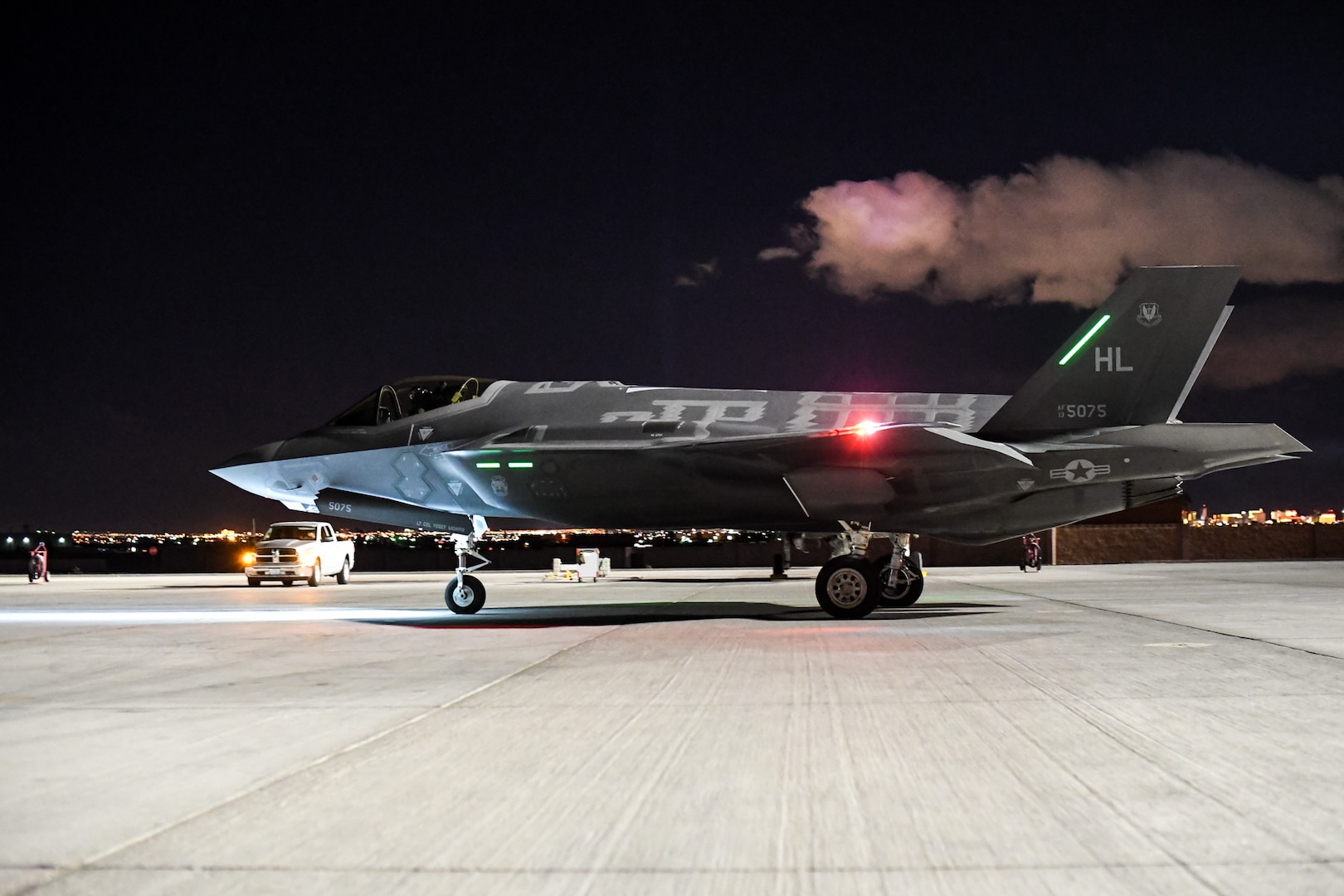 An F-35A Lightning II aircraft piloted by Lt. Col. Yosef Morris, 388th Fighter Wing, taxis during Red Flag 17-1, Nellis Air Force Base, Nevada, Feb. 3, 2017. Morris flew the 2,000th sortie during the Air Force's premier air-to-air combat training exercise. This is the first deployment of the F-35A to a Red Flag. Maintainers and pilots from Hill Air Force Base's 388th and 419th Fighter Wings deployed the fifth-generation fighter to Nellis AFB Jan. 20. The exercise provides aircrews the experience of multiple, intensive air combat sorties in the safety of a training environment. (U.S. Air Force photo/R. Nial Bradshaw))