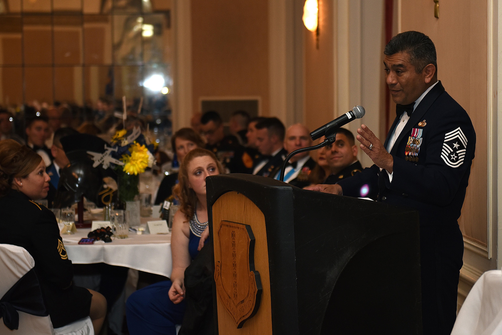 U.S. Air Force Retired Chief Master Sgt. Gerardo Tapia, Annual Awards guest speaker, delivers a speech about the ‘one degree’ that defines the annual award nominees during the Annual Awards Banquet at the Cactus Hotel in San Angelo, Texas, Feb. 3, 2017. The 17th Training Wing Command presented a 200 dollar check to Tapia for the Air Force Enlisted Village. (U.S. Air Force photo by Airman 1st Class Caelynn Ferguson/Released)