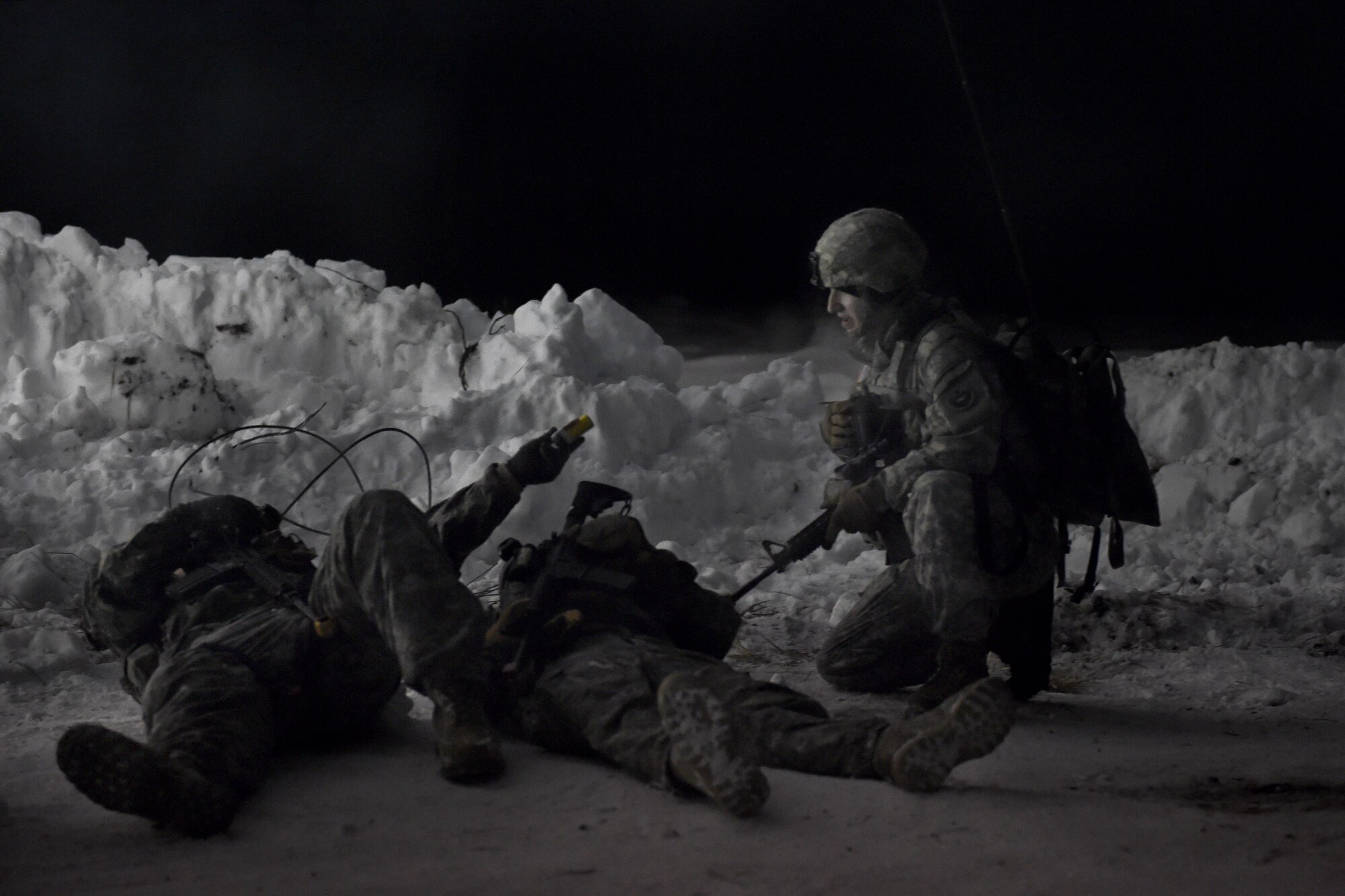 Army Soldiers assigned to the 574th Composite Supply Company, 17th Combat Sustainment Support Battalion, U.S. Army Alaska, respond a simulated attack while conducting force-protection sustainment training at Joint Base Elmendorf-Richardson, Alaska, Feb. 1, 2017. The Soldiers, from Fort Wainwright and JBER, participated in a week-long combat skills training exercise in preparation for an upcoming deployment. 