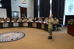 Navy Rear Adm. Deborah Haven, DLA JRF Director, speaks to Air Force IMAs during an IMA All Call Feb. 3 at the McNamara Headquarters Complex, Fort Belvoir, Va., The event was designed to help IMAs and their leaders understand the benefits  and practices of the Air Force IMA program. 