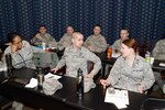 Air Force IMAs participate in an exercise during an IMA All Call Feb. 3 at the McNamara Headquarters Complex, Fort Belvoir, Va., The event was designed to help IMAs and their leaders understand the benefits and practices of the Air Force IMA program. 