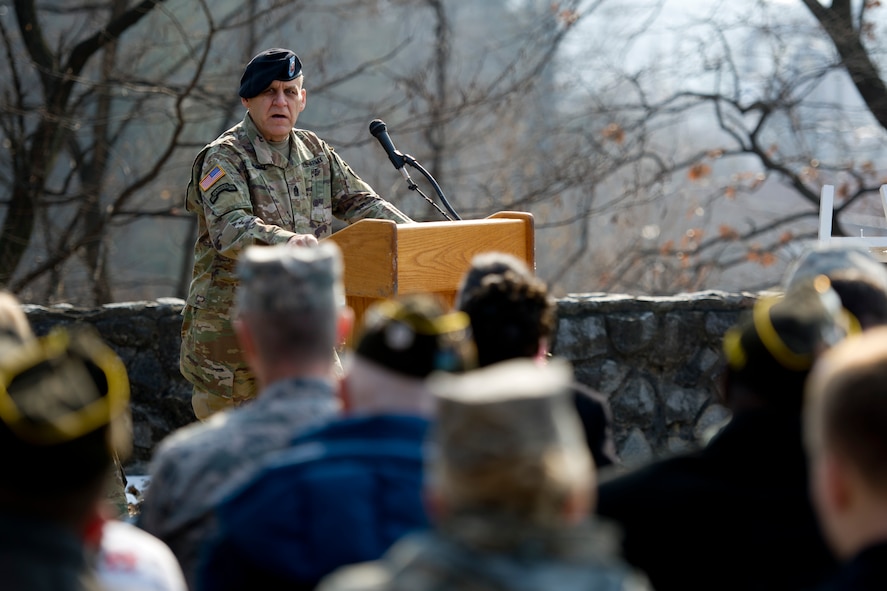 U.S. Army Command Sgt. Maj. Rick Merritt, Command Sergeant Major Eighth Army, speaks during the 66th Anniversary of the Battle of Bayonet Hill Commemoration Ceremony on Osan Air Base, Republic of Korea, Feb. 3, 2017. Merritt spoke about the Hill 180 bayonet charge led by U.S. Army Capt. Lewis Millett during the Korean War. (U.S. Air Force photo by Staff Sgt. Jonathan Steffen)