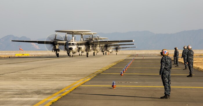 Five U.S. Navy E-2D Advanced Hawkeyes with Carrier Airborne Early Warning Squadron (VAW) 125, land at Marine Corps Air Station Iwakuni, Japan, Feb. 2, 2017. VAW-125 arrived at MCAS Iwakuni from Naval Station Norfolk, Va. The E-2D Advanced Hawkeye is equipped with the most advanced airborne radar in the world, possessing systems which increase the capabilities to defend Japan and provide security in the Indo-Asia-Pacific region. (U.S. Marine Corps photo by Lance Cpl. Jacob A. Farbo)