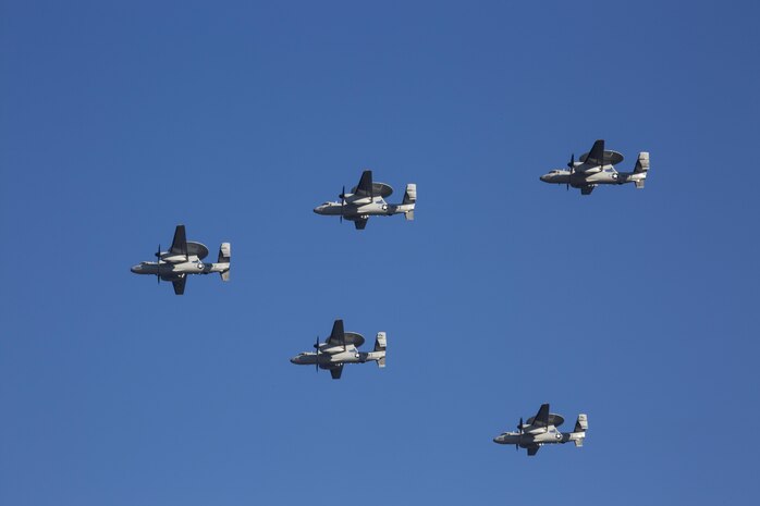 Five U.S. Navy E-2D Advanced Hawkeyes with Carrier Airborne Early Warning Squadron fly in a “V” formation prior to landing at Marine Corps Air Station Iwakuni, Japan, Feb. 2, 2017. VAW-125 arrived at MCAS Iwakuni from Naval Station Norfolk, Va. The E-2D Advanced Hawkeye is equipped with the most advanced airborne radar in the world, possessing systems which increase the capabilities to defend Japan and provide security in the Indo-Asia-Pacific region. (U.S. Marine Corps photo by Sgt Justin A. Fisher)