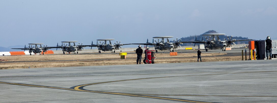 Five U.S. Navy E-2D Advanced Hawkeye with Carrier Airborne Early Warning Squadron (VAW) 125, taxis down the runway at Marine Corps Air Station Iwakuni, Japan, Feb. 2, 2017.VAW-125 arrived at MCAS Iwakuni, from Naval Station Norfolk, Va. The E-2D Advanced Hawkeye is equipped with the most advanced airborne radar in the world, possessing systems which increase the capabilities to defend Japan and provide security in the Indo-Asia-Pacific region. (U.S. Marine Corps photo by Cpl. James A. Guillory)