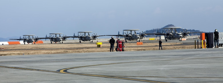 Five U.S. Navy E-2D Advanced Hawkeye with Carrier Airborne Early Warning Squadron (VAW) 125, taxis down the runway at Marine Corps Air Station Iwakuni, Japan, Feb. 2, 2017.VAW-125 arrived at MCAS Iwakuni, from Naval Station Norfolk, Va. The E-2D Advanced Hawkeye is equipped with the most advanced airborne radar in the world, possessing systems which increase the capabilities to defend Japan and provide security in the Indo-Asia-Pacific region. (U.S. Marine Corps photo by Cpl. James A. Guillory)