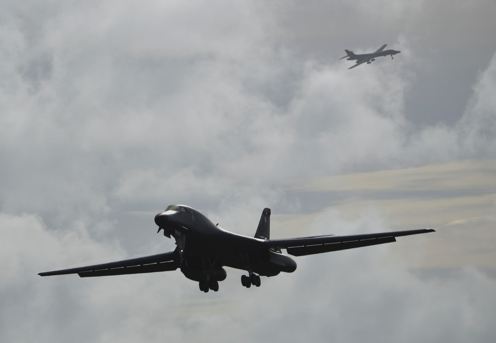 A U.S. Air Force B-1B Lancer assigned to the 9th Expeditionary Bomb Squadron, deployed from Dyess Air Force Base, Texas, lands Feb. 6, 2017, at Andersen AFB, Guam. The 9th EBS is taking over U.S. Pacific Command’s Continuous Bomber Presence operations from the 34th EBS, assigned to Ellsworth Air Force Base, S.D. This marks the second deployment of B-1s to Guam in over a decade. The B-1 is a highly versatile, multi-mission weapon system capable of tracking, targeting and engaging moving vehicles as well as allowing aircrew to receive targeting data from the Combined Air Operations Center or other command and control assets to strike emerging targets rapidly and efficiently. The U.S. military has maintained a deployed strategic bomber presence in the Pacific since March 2004, which has contributed significantly to regional security and stability. (U.S. Air Force photo by Tech. Sgt. Richard P. Ebensberger/Released)