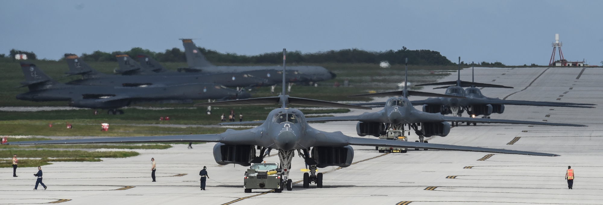 Four U.S. Air Force B-1B Lancers assigned to the 9th Expeditionary Bomb Squadron, deployed from Dyess Air Force Base, Texas, arrive Feb. 6, 2017, at Andersen AFB, Guam. The 9th EBS is taking over U.S. Pacific Command’s Continuous Bomber Presence operations from the 34th EBS, assigned to Ellsworth Air Force Base, S.D. The B-1B’s speed and superior handling characteristics allow it to seamlessly integrate in mixed force packages. These capabilities, when combined with its substantial payload, excellent radar targeting system, long loiter time and survivability, make the B-1B a key element of any joint/composite strike force. While deployed at Guam the B-1Bs will continue conducting flight operations where international law permit.  (U.S. Air Force photo by Tech. Sgt. Richard P. Ebensberger/Released)