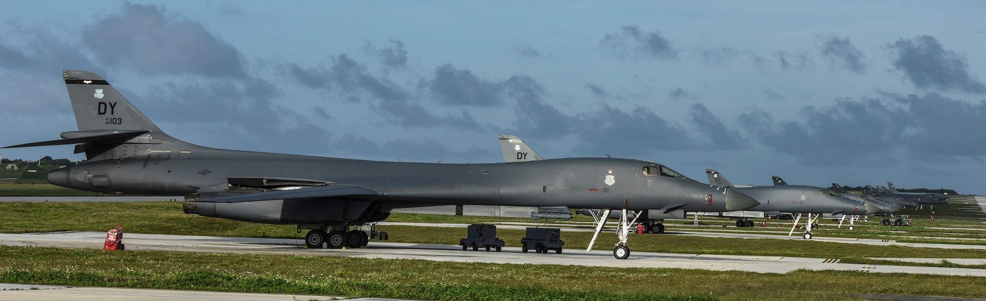 U.S. Air Force B-1B Lancers assigned to the 9th Expeditionary Bomb Squadron, deployed from Dyess Air Force Base, Texas, and the 34th EBS, assigned to Ellsworth Air Force Base, S.D., sit beside one another on the flightline Feb. 6, 2017, at Andersen AFB, Guam. The B-1B’s speed and superior handling characteristics allow it to seamlessly integrate in mixed force packages. These capabilities, when combined with its substantial payload, excellent radar targeting system, long loiter time and survivability, make the B-1B a key element of any joint/composite strike force. The 9th EBS is taking over U.S. Pacific Command’s Continuous Bomber Presence operations from the 34th EBS. The CBP mission is part of a long-standing history of maintaining a consistent bomber presence in the Indo-Asia-Pacific in order to maintain regional stability, and provide assurance to our allies and partners in the region. (U.S. Air Force photo by Tech. Sgt. Richard P. Ebensberger/Released)