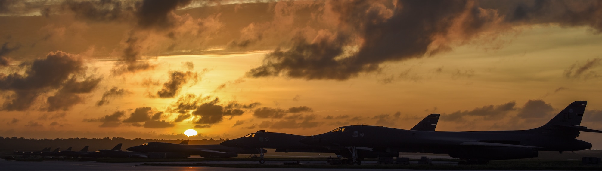 U.S. Air Force B-1B Lancers assigned to the 9th Expeditionary Bomb Squadron, deployed from Dyess Air Force Base, Texas, and the 34th EBS, assigned to Ellsworth Air Force Base, S.D., sit beside one another on the flightline Feb. 6, 2017, at Andersen AFB, Guam. The B-1B’s speed and superior handling characteristics allow it to seamlessly integrate in mixed force packages. These capabilities, when combined with its substantial payload, excellent radar targeting system, long loiter time and survivability, make the B-1B a key element of any joint/composite strike force. The 9th EBS is taking over U.S. Pacific Command’s Continuous Bomber Presence operations from the 34th EBS. The CBP mission is part of a long-standing history of maintaining a consistent bomber presence in the Indo-Asia-Pacific in order to maintain regional stability, and provide assurance to our allies and partners in the region. (U.S. Air Force photo by Tech. Sgt. Richard P. Ebensberger/Released)