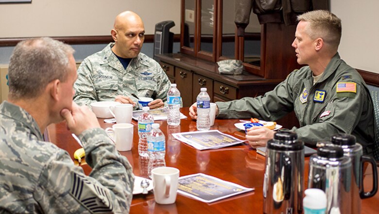 Brig. Gen. Brian Robinson (center), Air Mobility Command director of operations, meets with Col. Kelly Holbert (right), 43d Air Mobility Operations Group commander, and Chief Master Sgt. James Cope, 43d AMOG superintendent, during a brief visit to Pope Field Feb. 3. Robinson attended the Joint Forcible Entry Readiness Symposium at Fort Bragg and met with 43d AMOG leadership, where he discussed AMC’s ongoing support for the joint mission at Pope Field, and for the 43d AMOG’s mission of 24/7 operational mission execution, persistent Joint Airborne / Air Transportability Training, Pope Airmen support and Global Response Force Readiness.