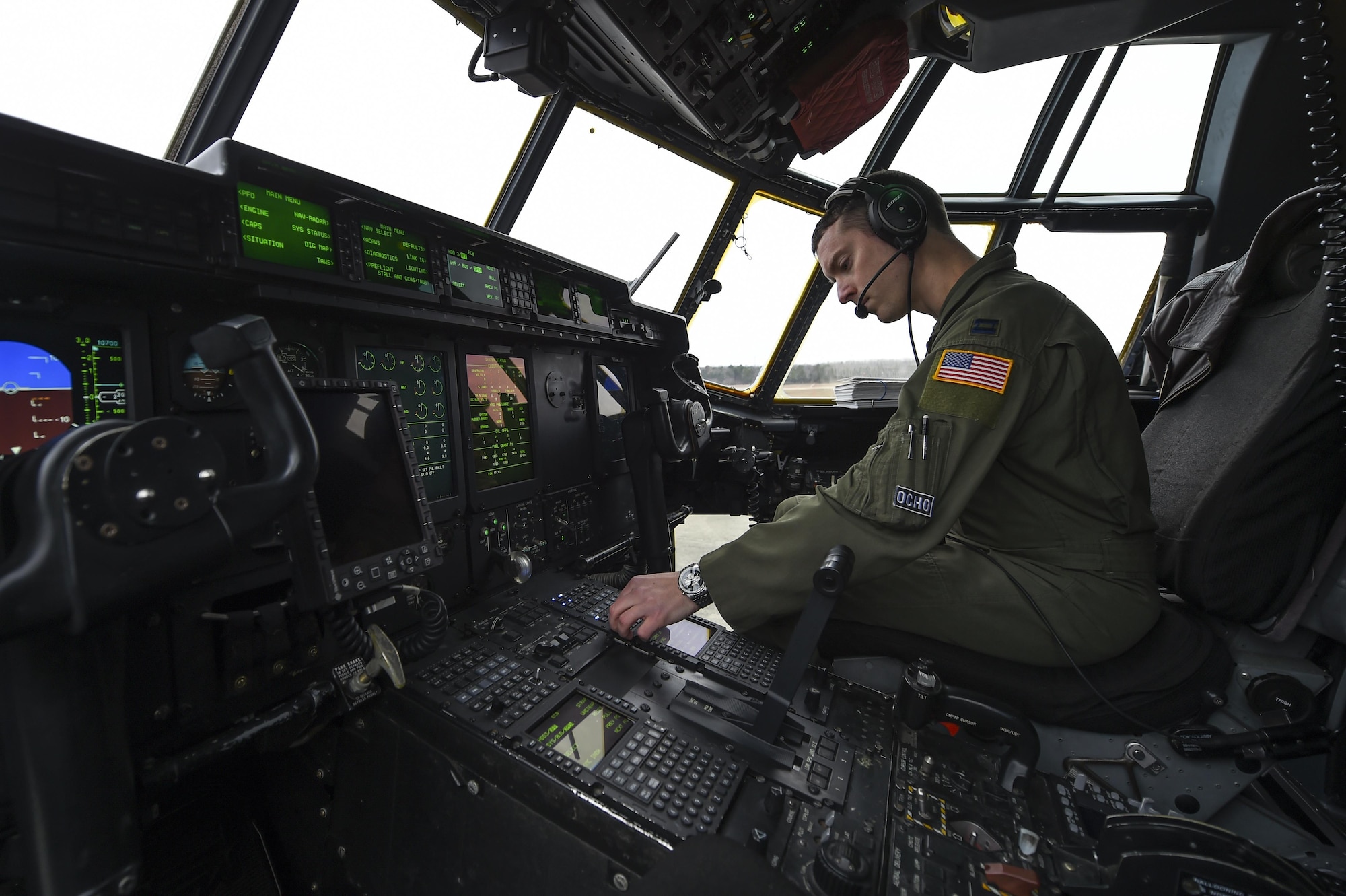 U.S. Air Force Capt. Kyle Gauthier, 61st Airlift Squadron C-130J pilot and flight commander, conducts a preflight checklist for a training sortie flight Feb. 3, 2017, at Little Rock Air Force Base, Ark. During the flight, aircrews tested the operability of recent hardware and software upgrades. (U.S. Air Force photo/Senior Airman Harry Brexel)