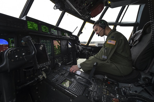 Capt. Kyle Gauthier, a 61st Airlift Squadron C-130J Super Hercules pilot and the flight commander, conducts a preflight checklist for a training sortie flight Feb. 3, 2017, at Little Rock Air Force Base, Ark. During the flight, aircrews tested the operability of recent hardware and software upgrades. (U.S. Air Force photo/Senior Airman Harry Brexel)