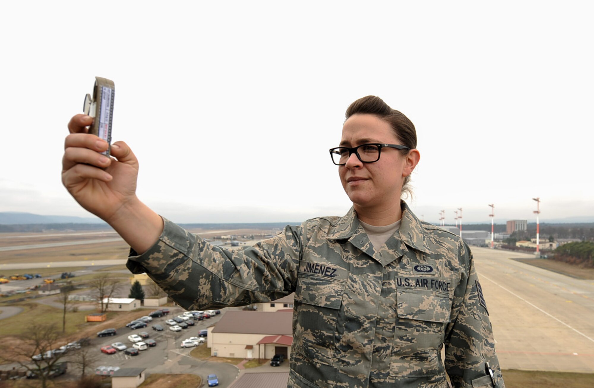 Staff Sgt. Nichol Jimenez, 86th OSS weather forecaster craftsman, holds a hand-held weather instrument called a kestrel on Ramstein Air Base, Germany, Feb. 7, 2017. Jimenez was awarded 2016’s Air Force Weather Airman of the Year while providing support to both the 37th and 76th Airlift Squadrons. (U.S. Air Force photo by Airman 1st Class Savannah L. Waters)