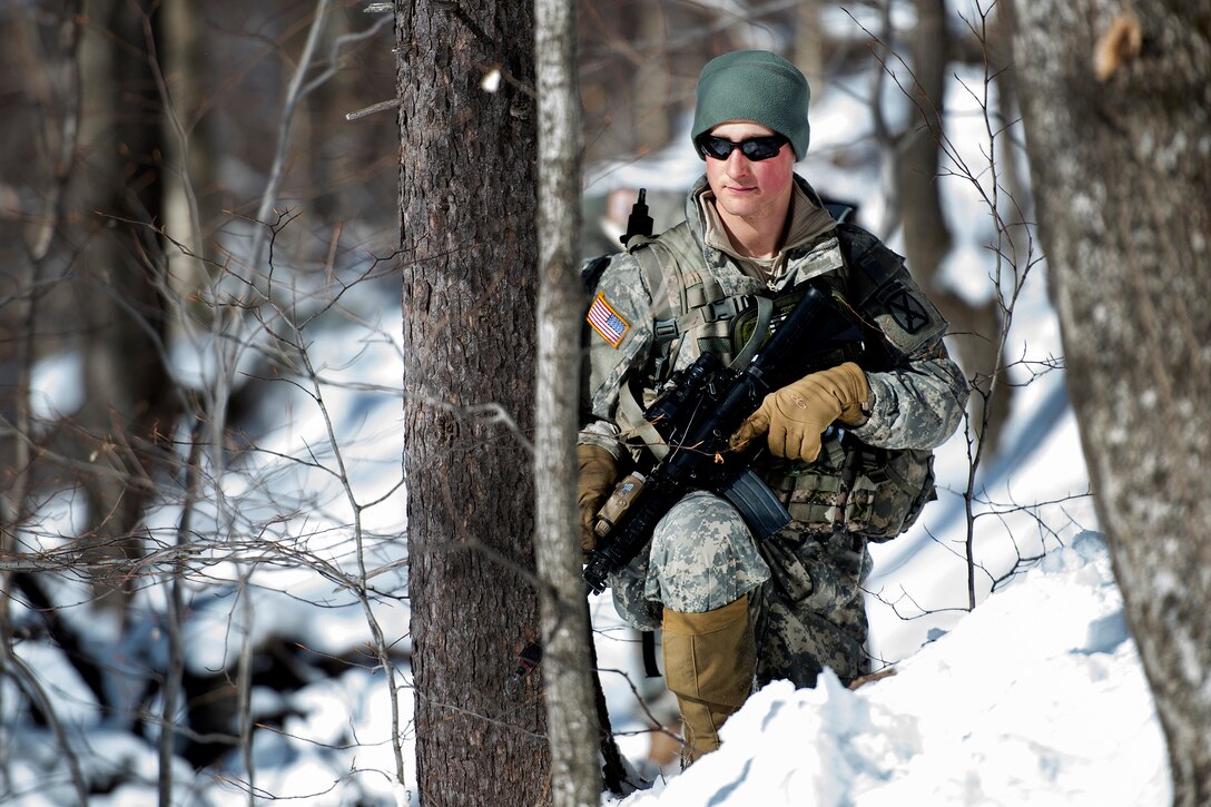 An Army National Guardsman navigates a slope during winter training at Camp Ethan Allen Training Site in Jericho, Vt., Jan. 31, 2017. The soldier is assigned to the Vermont Army National Guard’s Company A, 3rd Battalion, 172nd Infantry Regiment, 86th Infantry Brigade Combat Team (Mountain). Air National Guard photo by Tech. Sgt. Sarah Mattison