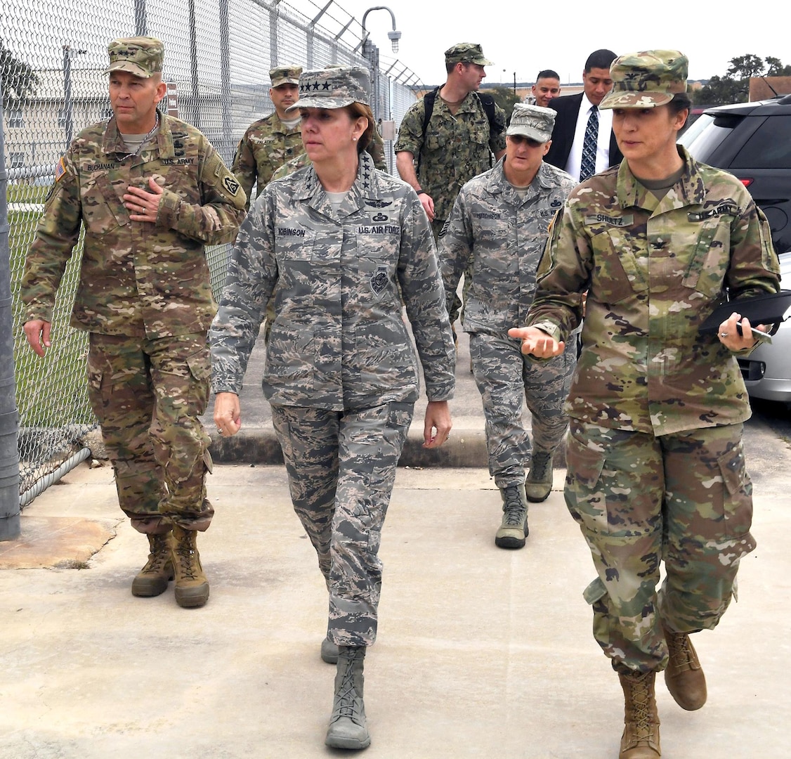 Col. Dustin Shultz (right), commander of the 505th Military Intelligence Brigade, leads Gen. Lori Robinson (center), commander of United States Northern Command and the North American Aerospace Defense Command, on a tour of the brigade as part of Robinson's Feb. 2 visit to Joint Base San Antonio-Camp Bullis, Texas. Army North Commander Lt. Gen. Jeffrey Buchanan is on the left.