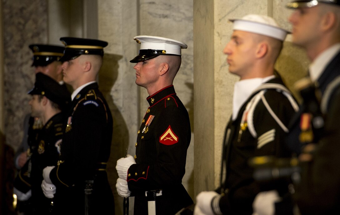 U.S. service members with the Joint Armed Forces Honor Guard line the hallway at the Senate Carriage Entrance to welcome dignitaries during the 58th Presidential Inauguration in Washington, D.C., Jan. 20, 2017. More than 5,000 military members from across all branches of the armed forces of the United States, including reserve and National Guard components, provided ceremonial support and Defense Support of Civil Authorities during the inaugural period. (DoD photo by U.S. Air Force Staff Sgt. Marianique Santos)