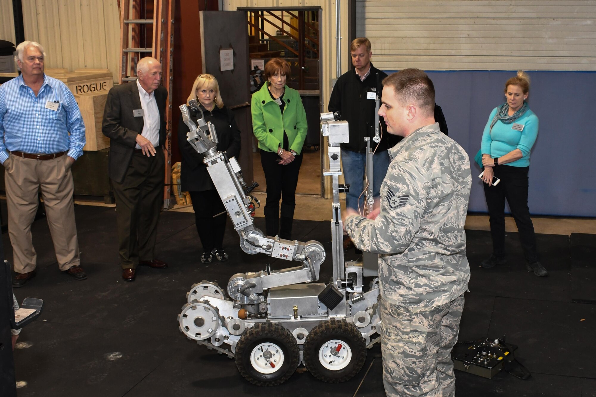 Members of the Young Presidents Organization get a demonstration of and Andros F-6 robot Feb. 3, 2017, Barksdale Air Force Base, La.  The robot is used by 2nd Civil Engineer Squadron Explosive Ordinance Disposal flight members to safely handle unexploded ordinance. Members of the YPO Louisiana Chapter visited Barksdale to get a better understanding of the various jobs and leadership challenges experienced by Airmen during day-to-day operations. (U.S. Air Force photo by Tech. Sgt. Ted Daigle/Released)