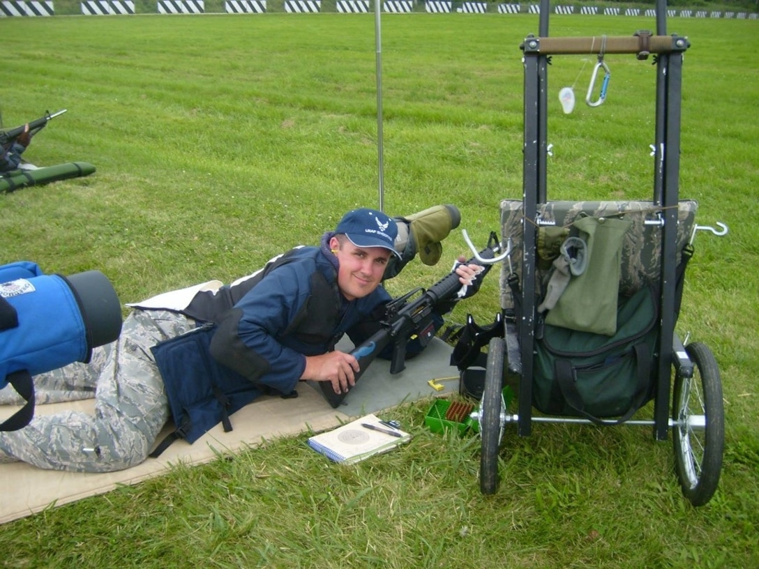 Air Force Office of Special Investigations Special Agent David Ohlinger pauses during the Excellence- in-Competition National Marksmanship Matches at Camp Perry, Ohio. SA Ohlinger is only the 353rd marksman in history to earn the coveted Air Force Distinguished Rifleman Badge. (U.S. Air Force photo/Staff Sgt. Andrew Lee) 