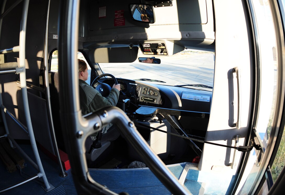 U.S. Air Force Airman 1st Class Jordan Owen, 7th Logistics Readiness Squadron vehicle operator, drives a surrey bus during a distinguished visitor tour at Dyess Air Force Base, Texas, Dec. 12, 2016. Vehicle operators support about five distinguished visitor tours a month and transport aircrews to and from their aircraft about eight times a day. (U.S. Air Force photo by Airman 1st Class April Lancto)