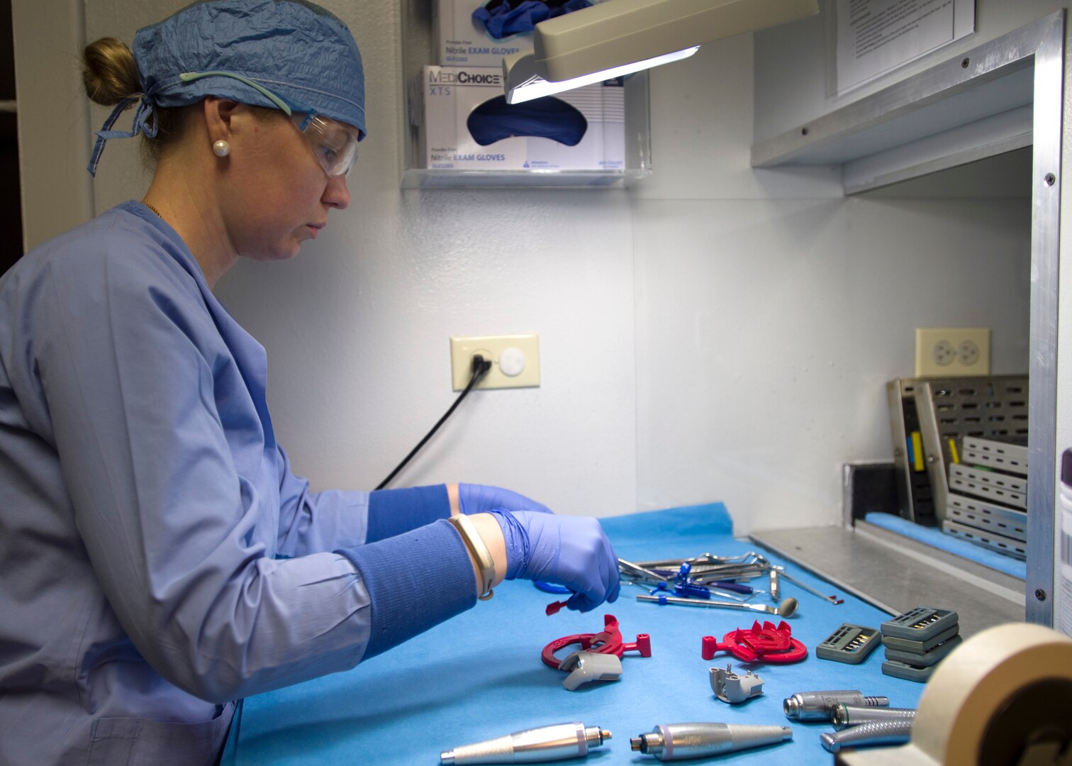 Svetlana Pohovey, 359th Medical Group registered dental assistant, cleans and sterilizes dental equipment at the Randolph dental clinic on Joint Base San Antonio-Randolph, Texas, Jan. 10. Sterilizing dental equipment is critical to patient safety. (U.S. Air Force photo/Staff Sgt. Kevin Iinuma)