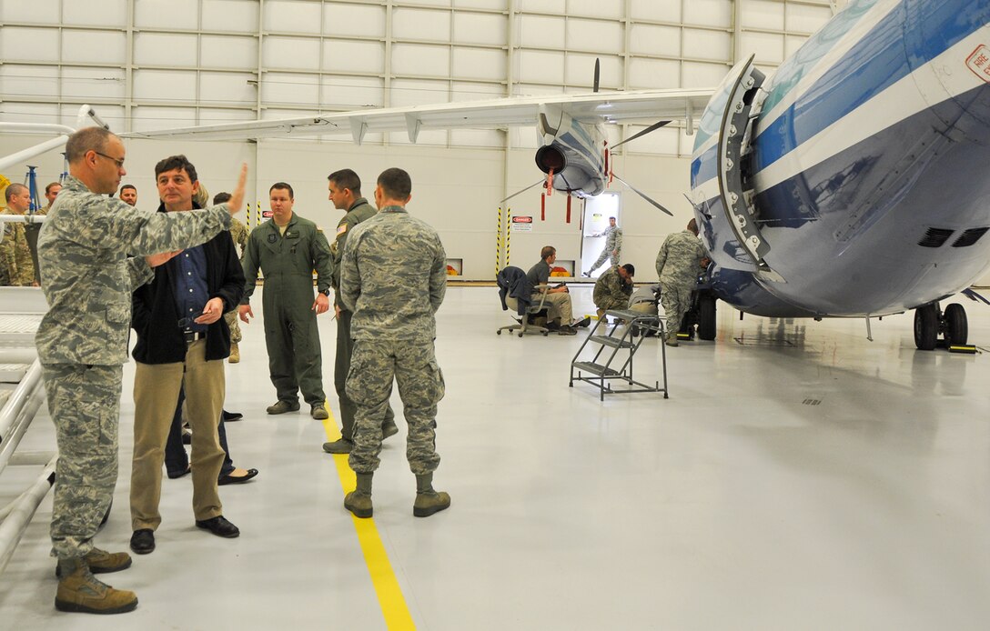 Maj. Terrell Eickner, 919th Special Operations Aircraft Maintenance Squadron commander, discusses the C-145A Skytruck mission with Steven Willman, Air Force Special Operations Directorate of Operations, at Duke Field recently. Willman was part of the AFSOC Civilian Leadership Development Group that visited with the Citizen Air Commandos to learn more about their contributions to the special operations community.  (U.S. Air Force photo/Dan Neely)