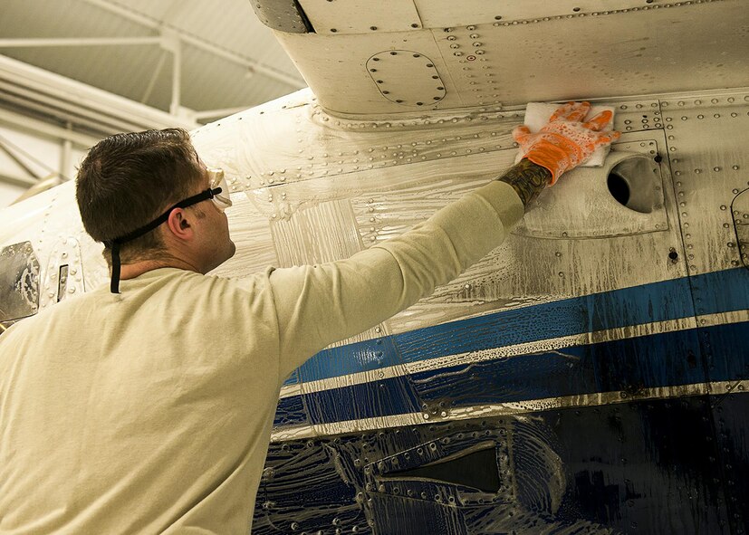 A 919th Special Operations Maintenance Group Airman washes a C-145 Skytruck at Duke Field, Fla.  (U.S. Air Force photo/Tech. Sgt. Jasmin Taylor)