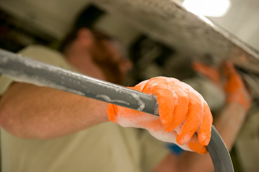 A 919th Special Operations Maintenance Group Airman washes a C-145 Skytruck at Duke Field, Fla.  (U.S. Air Force photo/Tech. Sgt. Jasmin Taylor)