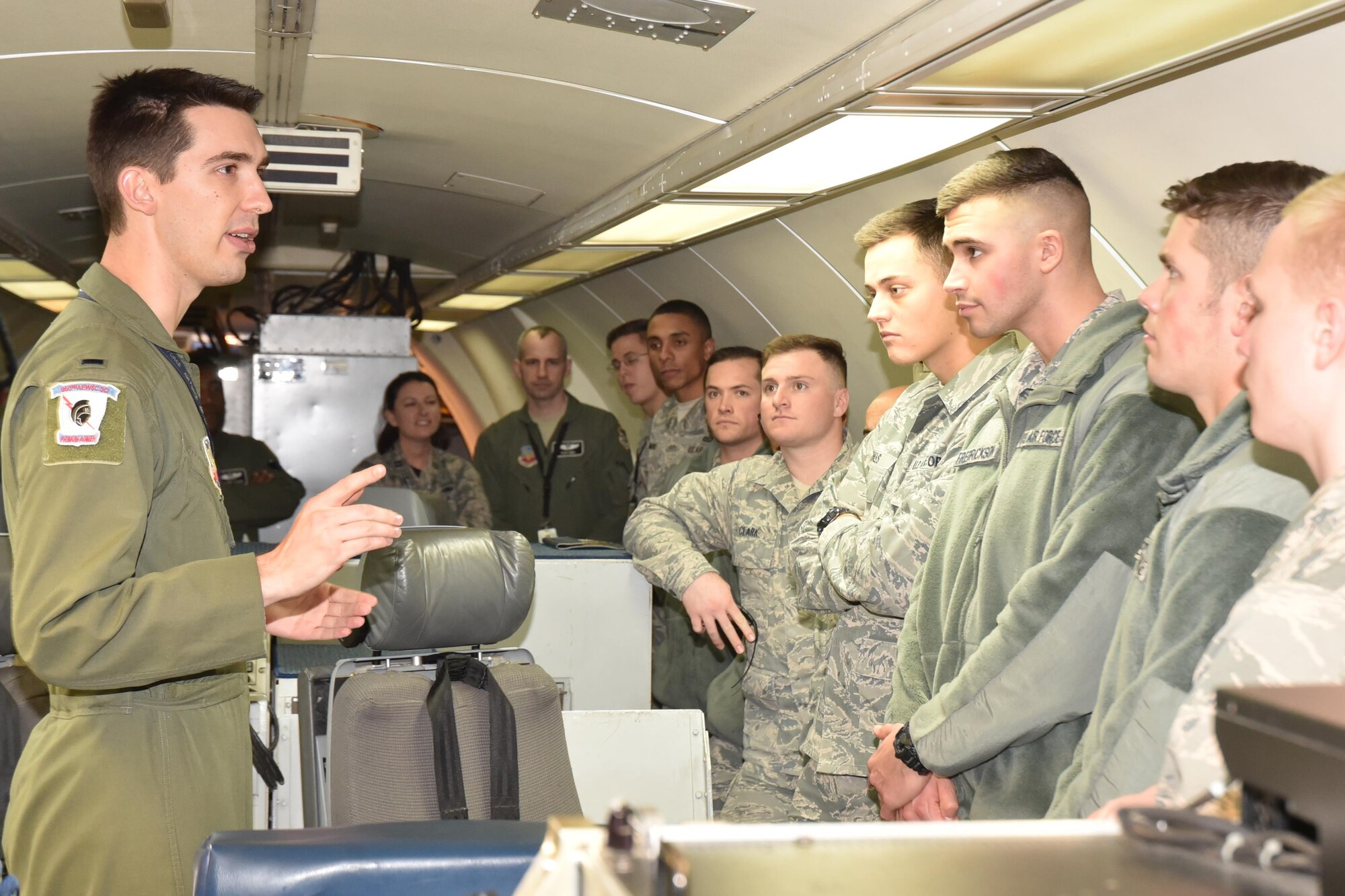 1st Lt. Robert, 960th Airborne Air Control Squadron, discusses tactics and aircraft battle management with Air Force Reserve Officer Training Corps cadets from Texas Christian University.  The cadets spent two days being immersed in the operations of the Air Force Sustainment Center, the Oklahoma City Air Logistics Complex and the 552nd Air Control Wing.            (Air Force photo by Ron Mullan)