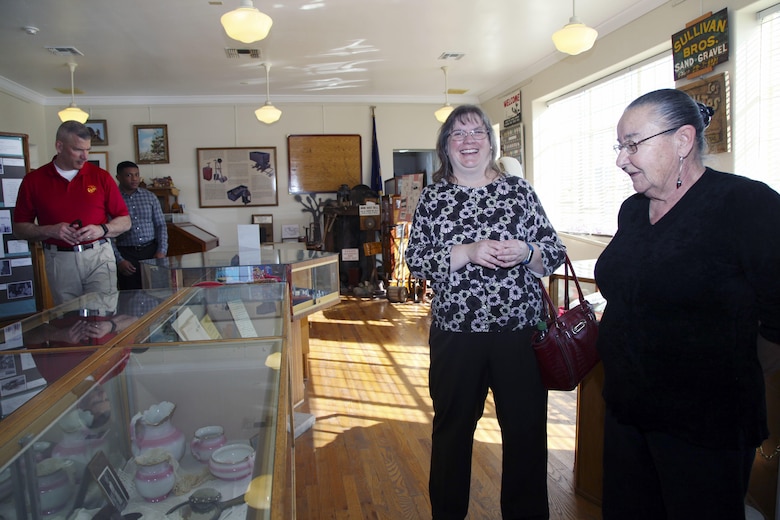 Brig. Gen. William F. Mullen III, Combat Center Commanding General, left, and Cpl. Ben Mills, driver, view items on display at the Old Schoolhouse Museum in Twentynine Palms, Calif., Jan. 31, 2017, as his wife, Vicki, shares a laugh with Twentynine Palms Historical Society volunteer Pat Rimmington. The general and his wife toured the facility with Sgt. Maj. Michael J. Hendges, Combat Center Sergeant Major; Mills; Jim Ricker, Combat Center Assistant Chief of Staff for Government and External Affairs; and Kristina Becker, Combat Center External Affairs Director. (Official Marine Corps photo by Kelly O'Sullivan/Released)