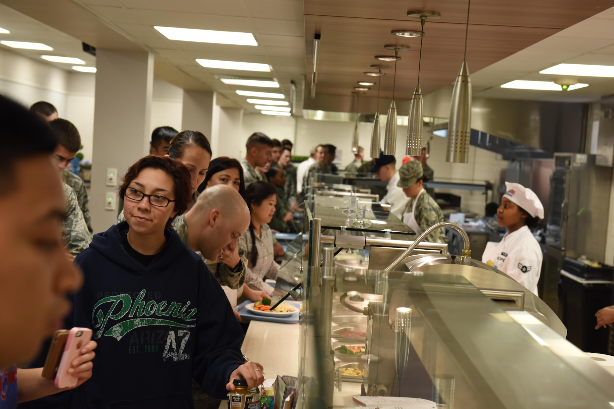 Airman 1st Class Kyle Harris, 2nd Force Support Squadron services Airman, prepares a quesadilla at the newly re-opened Red River Dining Facility at Barksdale Air Force Base, La., Feb. 2, 2017. The dining facility offers a large variety of food, giving airmen healthy and tasteful options for their meals. (U.S. Air Force photo/Senior Airman Luke Hill)