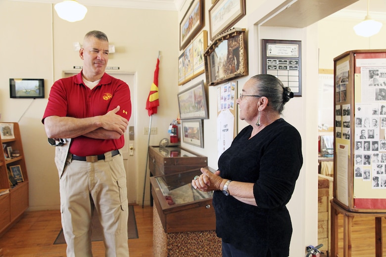 Brig. Gen. William F. Mullen III, Combat Center Commanding General, left, talks with Twentynine Palms Historical Society volunteer Pat Rimmington about local history during a tour of the Old Schoolhouse Museum in Twentynine Palms, Calif., Jan. 31, 2017. The general and his wife, Vicki, toured the facility with Sgt. Maj. Michael J. Hendges, Combat Center Sergeant Major; Cpl. Ben Mills, driver; Jim Ricker, Combat Center Assistant Chief of Staff for Government and External Affairs; and Kristina Becker, Combat Center External Affairs Director. (Official Marine Corps photo by Kelly O'Sullivan/Released)