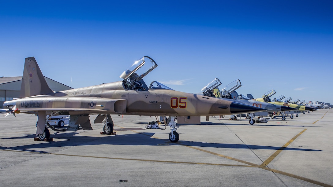 F-5N Tiger II jets standby on the flight line aboard Marine Corps Air
Station Beaufort, Jan, 27. Marine Fighter Training Squadron 401 worked with Marine Aviation Weapons and Tactics Squadron One to conduct the Marine Division Tactics Course at the air station. VMFT-401 provided the adversary air while the MAWTS-1 instructor pilots taught and evaluated MCAS Beaufort F-18 pilots during the course. Both VMFT-401 and MAWTS-1 are stationed aboard MCAS Yuma, Ariz.