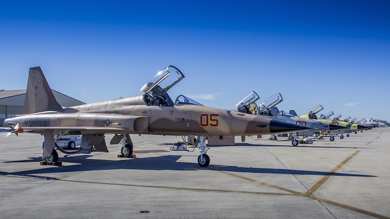 F-5N Tiger II jets standby on the flight line aboard Marine Corps Air
Station Beaufort, Jan, 27. Marine Fighter Training Squadron 401 worked with Marine Aviation Weapons and Tactics Squadron One to conduct the Marine Division Tactics Course at the air station. VMFT-401 provided the adversary air while the MAWTS-1 instructor pilots taught and evaluated MCAS Beaufort F-18 pilots during the course. Both VMFT-401 and MAWTS-1 are stationed aboard MCAS Yuma, Ariz.