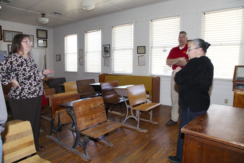 Vicki Mullen, left, and Brig. Gen. William F. Mullen III, Combat Center Commanding General, talk with Twentynine Palms Historical Society volunteer Pat Rimmington about local history during a tour of the Old Schoolhouse Museum in Twentynine Palms, Calif., Jan. 31, 2017. The general and his wife toured the facility with Sgt. Maj. Michael J. Hendges, Combat Center Sergeant Major; Cpl. Ben Mills, driver; Jim Ricker, Combat Center Assistant Chief of Staff for Government and External Affairs; and Kristina Becker, Combat Center External Affairs Director. (Official Marine Corps photo by Kelly O'Sullivan/Released)