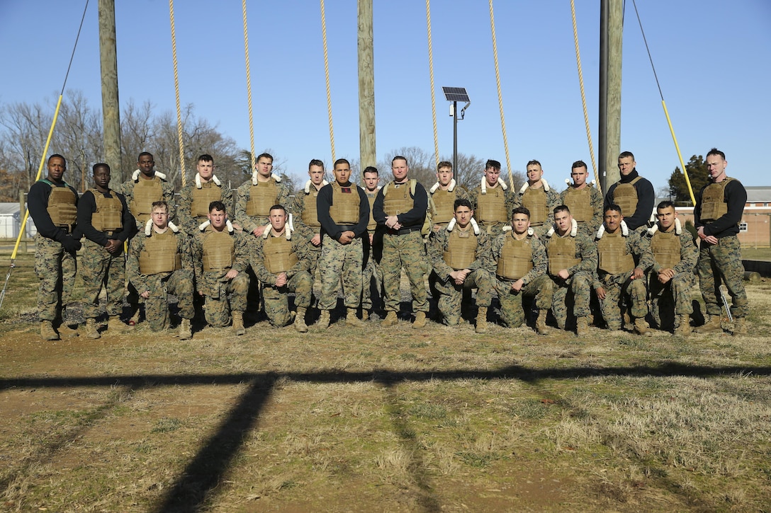 Marines from Marine Barracks Washington D.C. pose for a photo after completing a Marine Corps Martial Arts Instructor Course at Marine Corps Base Quantico, Va., Dec. 15, 2016. 