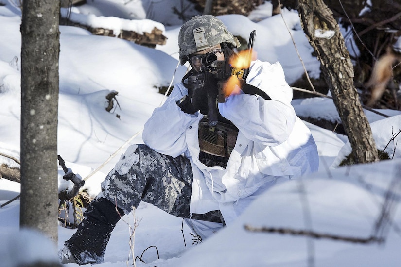 Army National Guard Staff Sgt. Jason Staff engages simulated opposing forces during winter training at Camp Ethan Allen Training Site, Vt., Jan. 31, 2017. Staff is an infantryman assigned to the Colorado National Guard’s Company C, 1st Battalion, 157th Infantry Regiment. Air National Guard photo by Tech. Sgt. Sarah Mattison