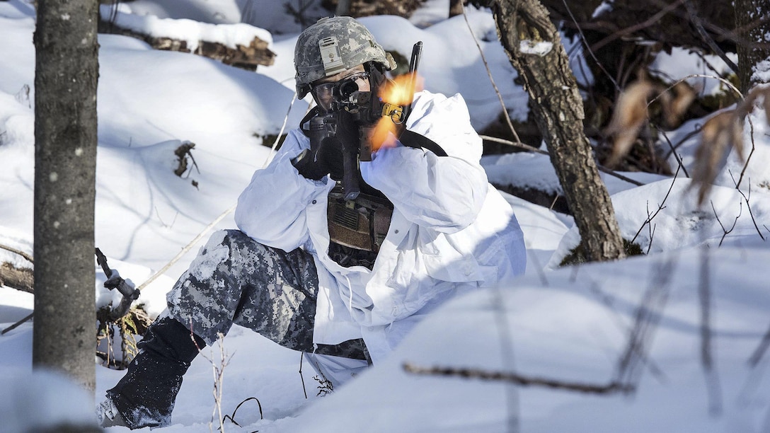 Army National Guard Staff Sgt. Jason Staff engages simulated opposing forces during winter training at Camp Ethan Allen Training Site, Vt., Jan. 31, 2017. Staff is an infantryman assigned to the Colorado National Guard’s Company C, 1st Battalion, 157th Infantry Regiment. Air National Guard photo by Tech. Sgt. Sarah Mattison