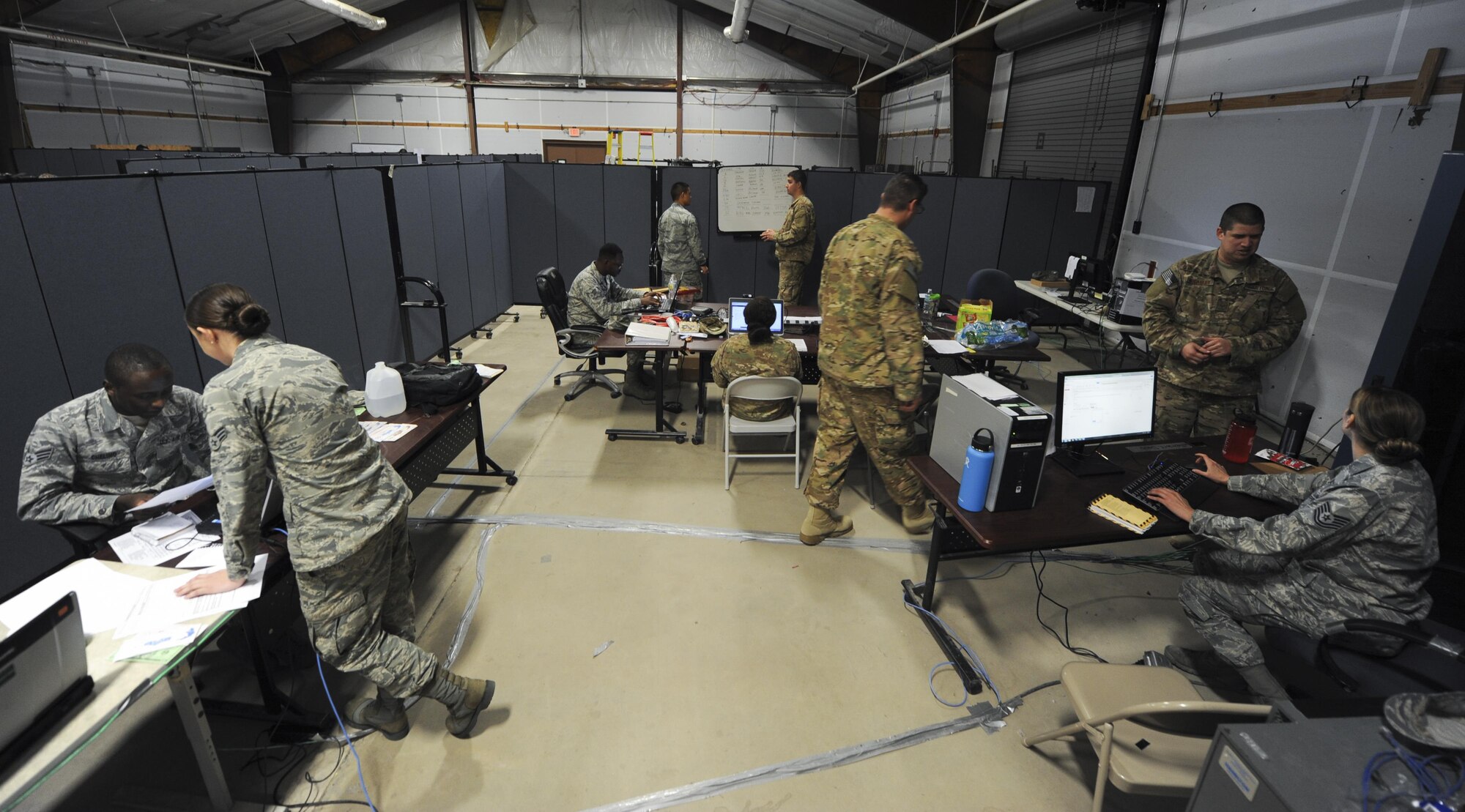 Air Commandos perform critical tasks during an exercise at Hurlburt Field, Fla., Feb. 2, 2017. The Joint Contingency Contracting Officer Training Exercise was an exercise used to simulate a deployed environment to increase global vigilance in every mission and every domain. (U.S. Air Force photo by Airman Dennis Spain)