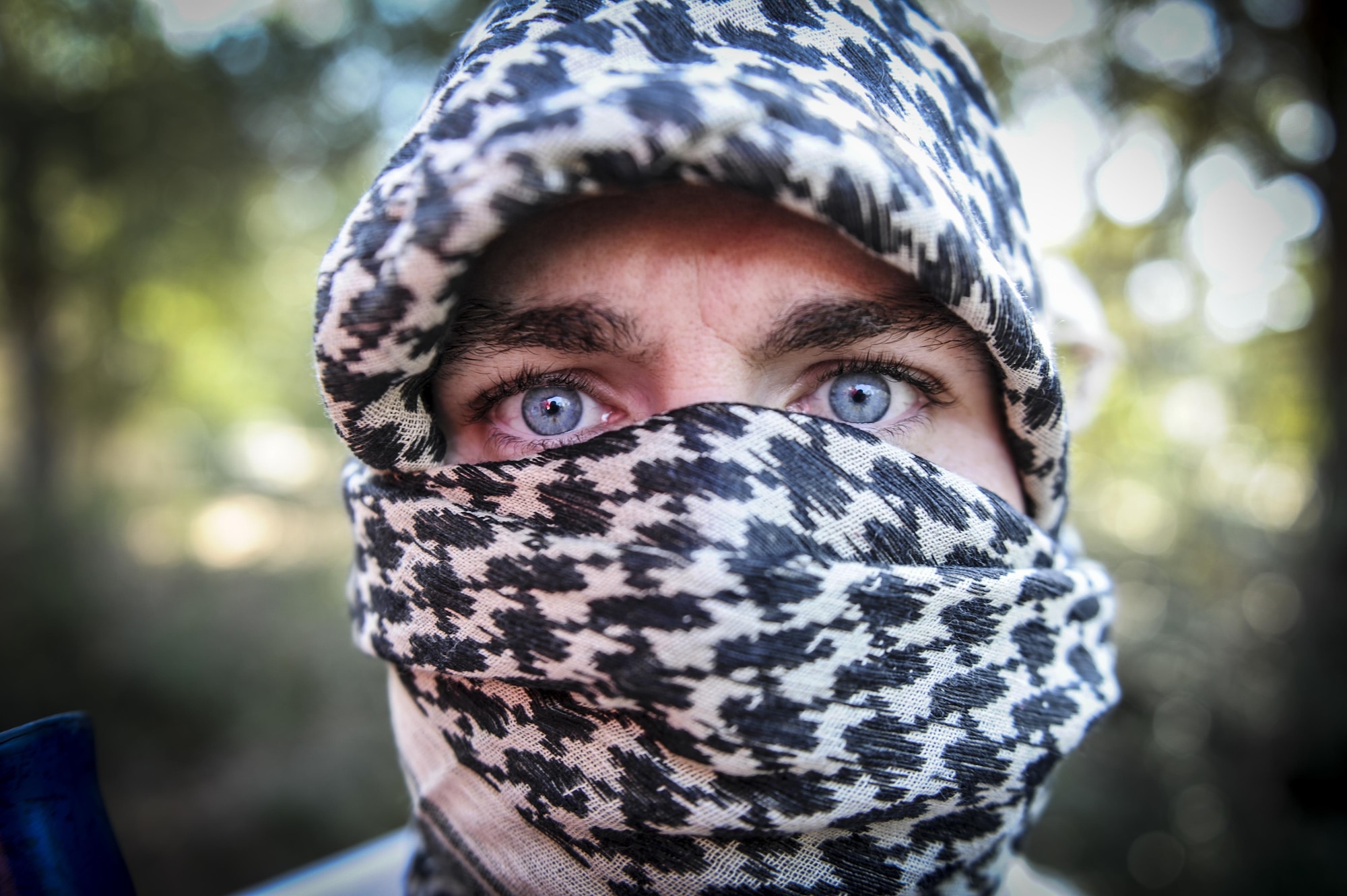 2nd Lt. Will Mitchell, flight commander of financial analysis with the 1st Special Operations Comptroller Squadron, dresses up as an opposition force during an exercise at Hurlburt Field, Fla., Feb. 2, 2017. The Joint Contingency Contracting Officer Training Exercise was an exercise used to replicate a deployed environment to strengthen global reach and prepare Air Commandos for future operations. (U.S. Air Force photo by Airman Dennis Spain)
