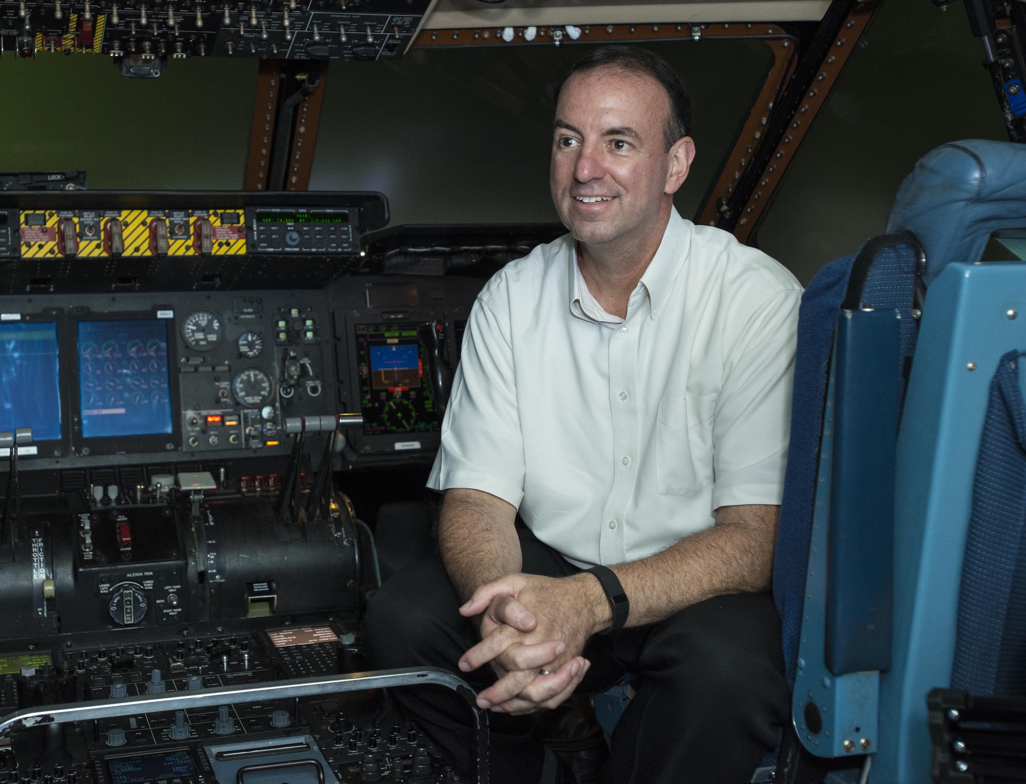 Retired Chief Master Sgt. Bryan Burns, 60th Operations Support Squadron, poses for a photo inside a C-5M Super Galaxy at Travis Air Force Base, Calif., June 6, 2016. Burns flew from McChord Air Force Base, Wash., to Travis AFB on July 9, 1986 in just two hours to be present for the birth of his son Matthew. Burns served 25 years in the U.S. Air Force and retired in 2007. (U.S. Air Force Photo by Heide Couch/Released)