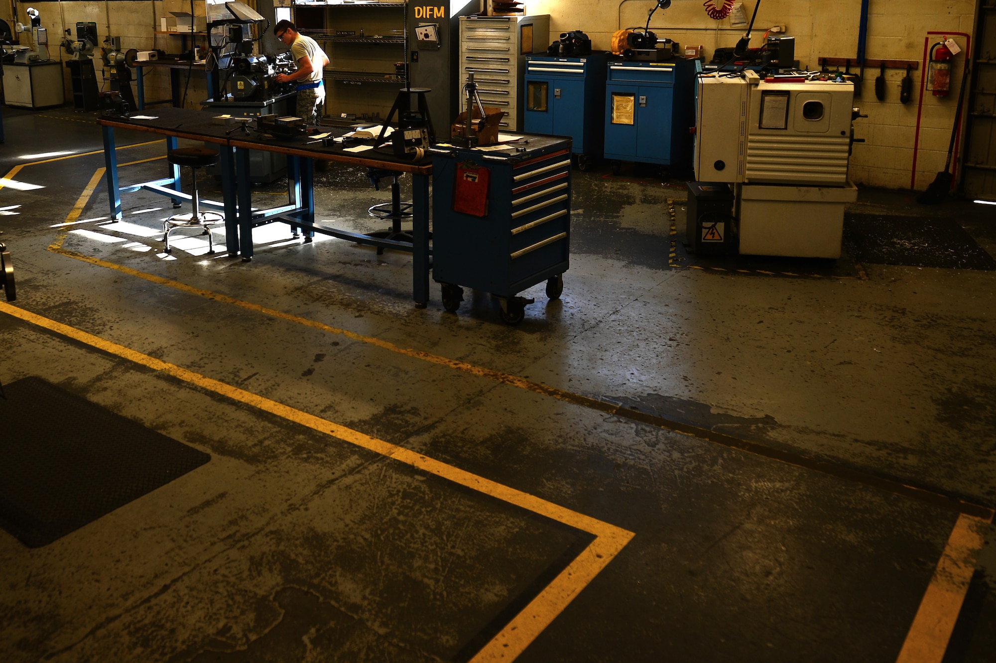 U.S. Air Force Airman 1st Class Mason Carny, 20th Equipment Maintenance Squadron aircraft metals technology technician, inspects machinery at the metals technology lab at Shaw Air Force Base, S.C., Jan. 31, 2017. The 20th EMS metals technology lab is responsible for ensuring smaller pieces of broken equipment including bolts and gears are repaired and ready for installation into assets such as the F-16CM Fighting Falcon. (U.S. Air Force photo by Airman 1st Class Christopher Maldonado)