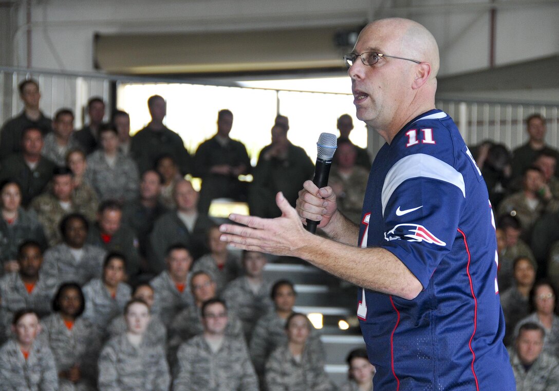 Chief Master Sgt. Pete Webb, the 919th Special Operations Wing’s interim command chief and New England Patriots fan, speaks with Airmen prior to the wing’s annual awards ceremony at Duke Field, Fla., Feb. 5.  (U.S. Air Force photo/Dan Neely)