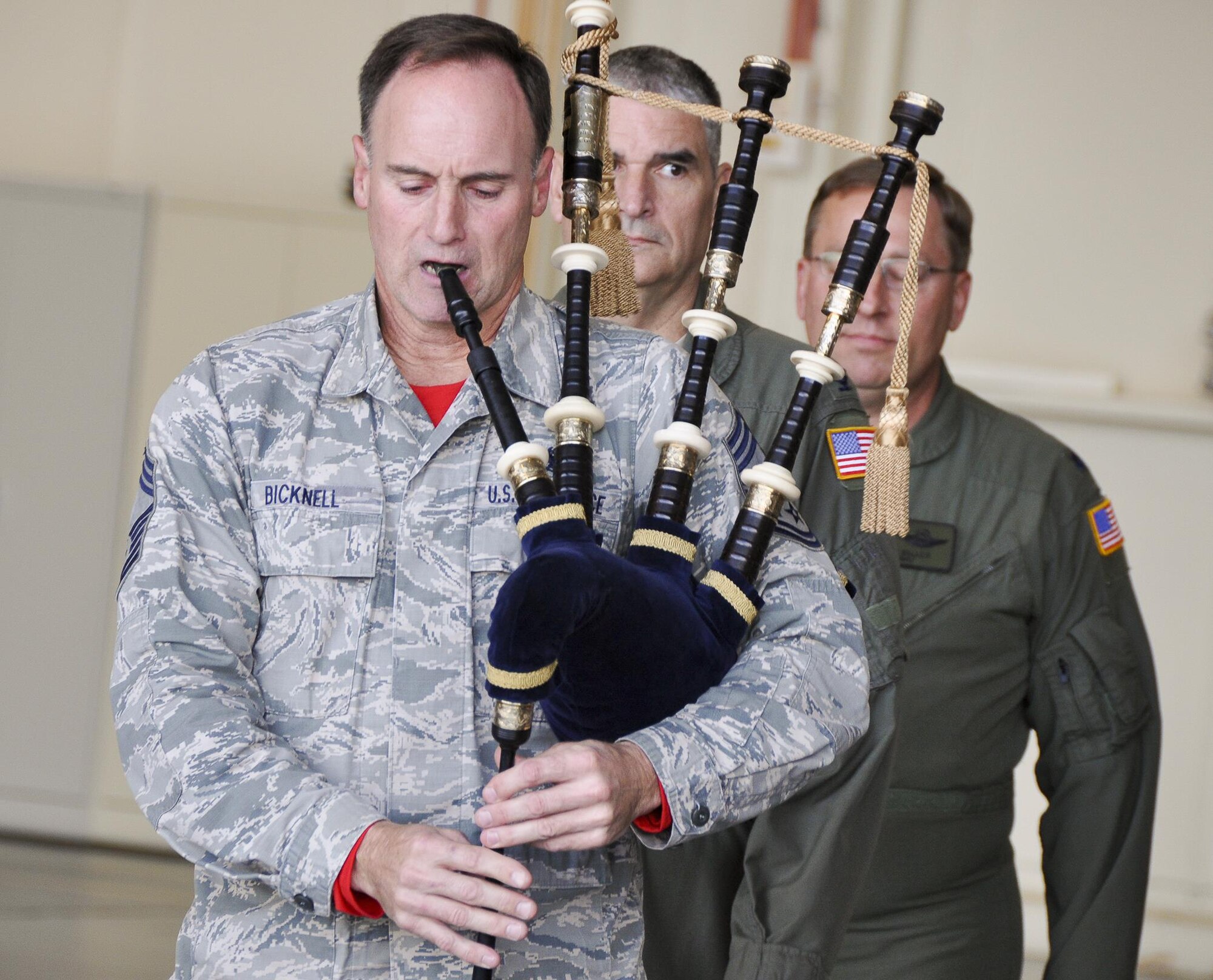 The official party enters to the playing of bagpipes during the retirement ceremony of Lt. Col. Tom Miller, 919th Special Operations Wing, Feb. 4 at Duke Field, Fla. (U.S. Air Force photo/Dan Neely)
