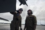 U.S. Marine Corps Sgt. Christopher Edwards, left, and U.S. Marine Corps Cpl. Angel Osoria, aviation ordnance Marines with Marine All Weather Fighter Attack Squadron (VMFA) 225, inspect an F/A-18D Hornet during exercise Cope North 17 at Andersen Air Force Base, Feb. 3, 2017.  The Marines inspect the aircraft prior to take off to ensure it is fit for flight. Marines trained with the Royal Australian Air Force and Japan Air Self-Defense Force supporting theater security, focusing on dissimilar air combat training and large force employment. 